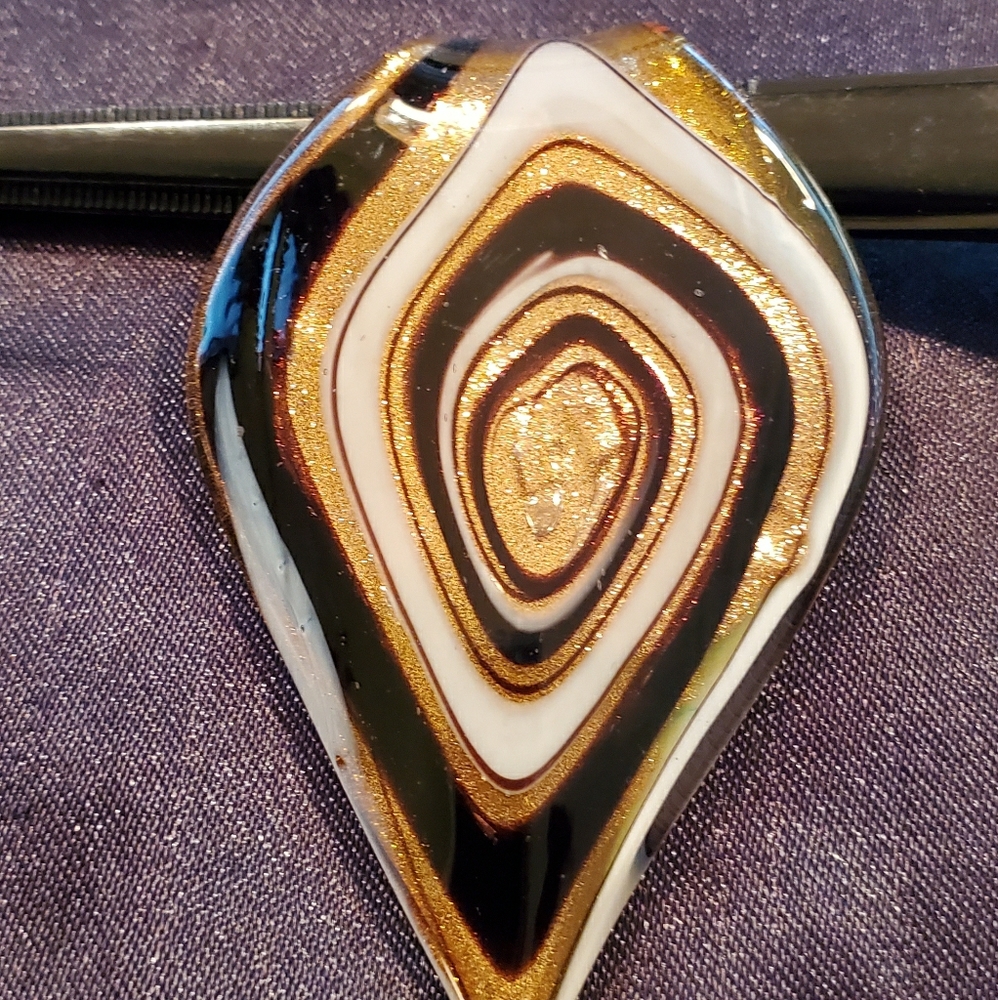Gold, black and gray pendant